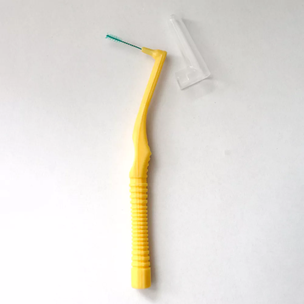 Escova de limpeza interdental